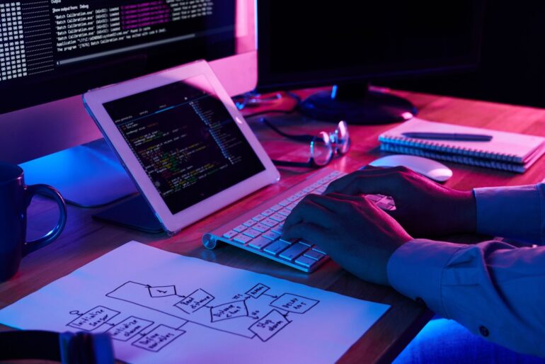 Programer working at his desk in office