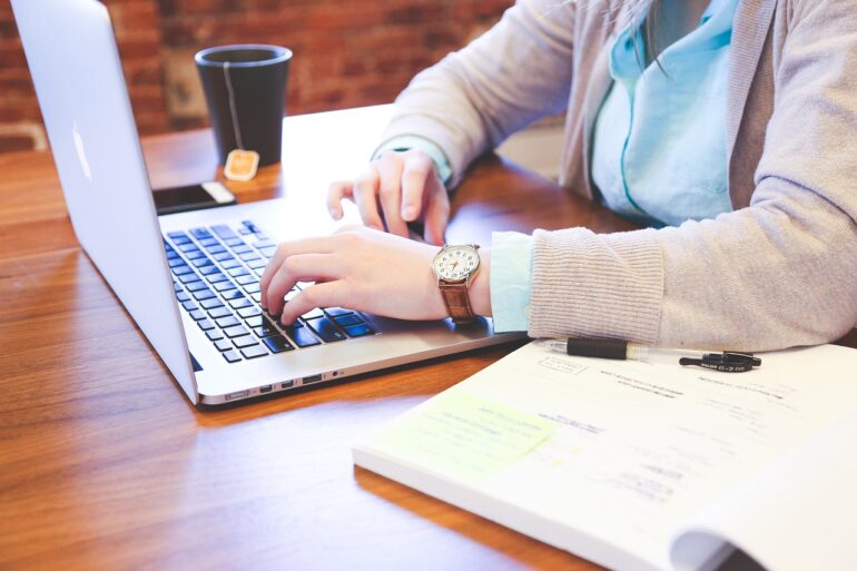 Woman is working on the computer.